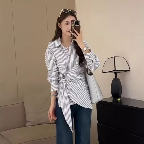 cn-11134207-820l4-mfbzs1jc5xcaf9.webp Korean Style Waist Controlled Lace up Loose Striped Shirt Women Unique Elegant Long Sleeve Shirt Blouse Women