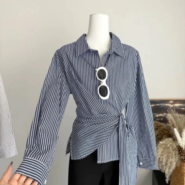 sg-11134201-7rd3t-m6xr261i4hl8c6.webp Korean Style Waist Controlled Lace up Loose Striped Shirt Women Unique Elegant Long Sleeve Shirt Blouse Women